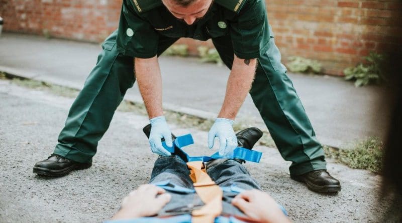 Man on Stretcher Being Secured