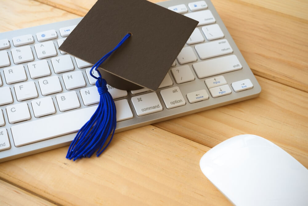 Graduate Hat on Keyboard Online CPR Certification