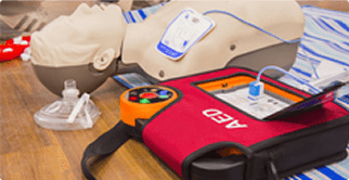 Using AED machine on manikin