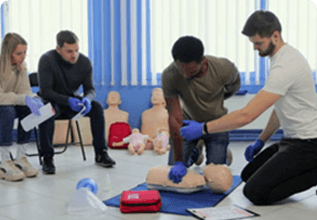 CPR training by two instructors for students watching it