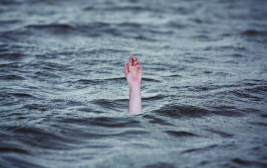 Hand Rising From the Water